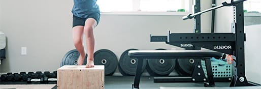 kid doing exercise at the gym